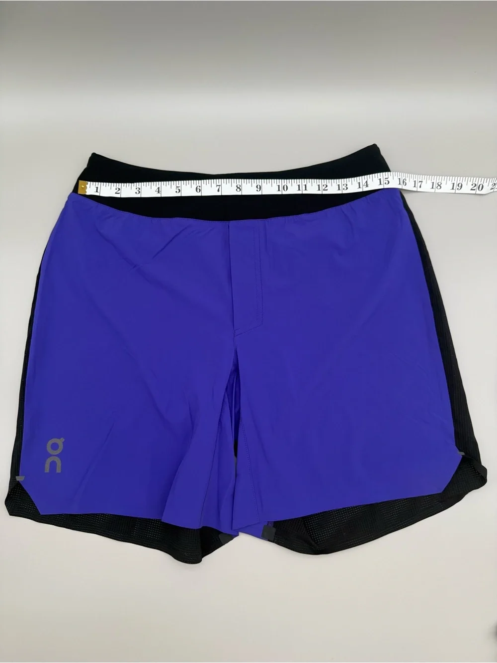 On Running Black Waistband blue and black Men Running Shorts size men’s Medium.